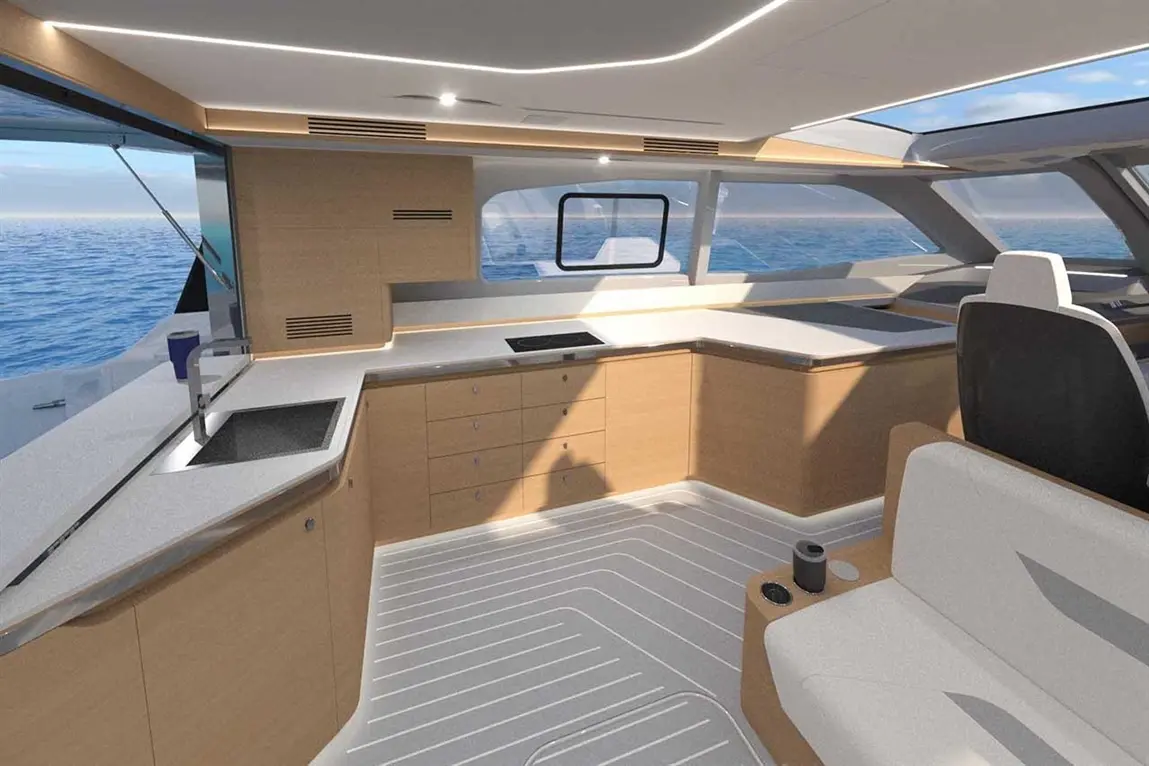 Modern yacht interior featuring a spacious kitchen area, large windows, sleek cabinetry, and a comfortable seating area.